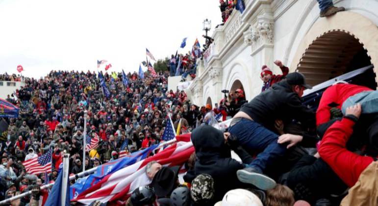 Apoiadores de Trump em 6 de janeiro de 2021, na invasão ao Capitólio, em Washington